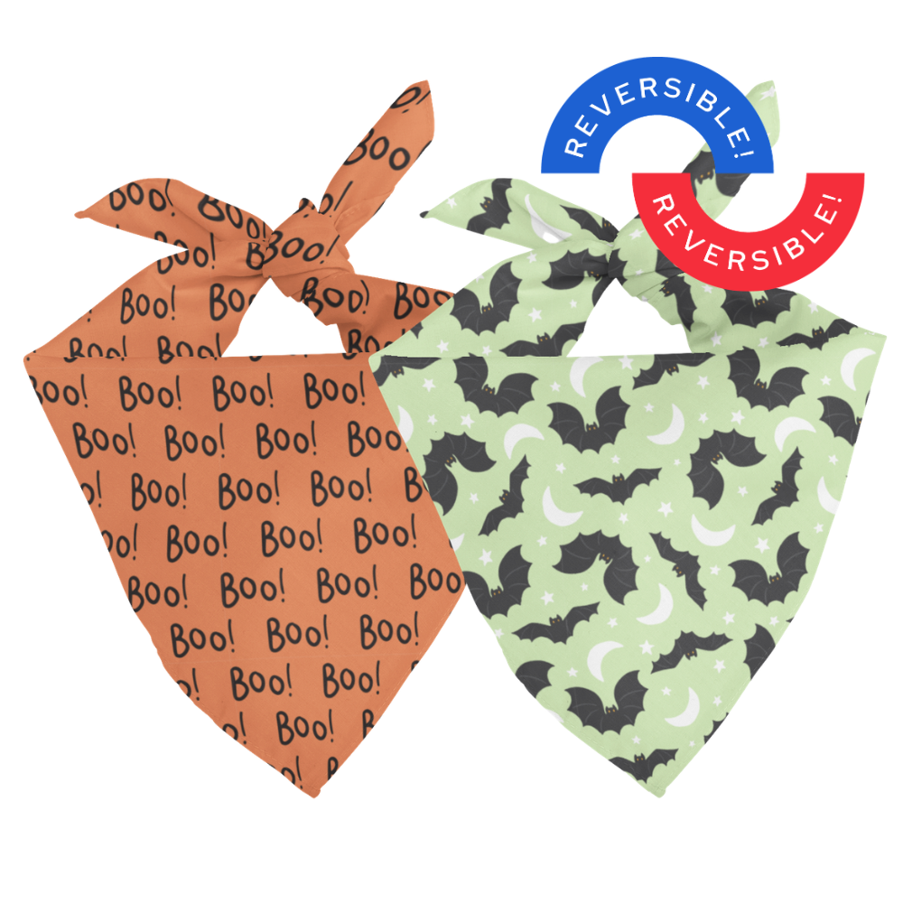 Two reversible pet bandanas with Halloween designs on a white background.