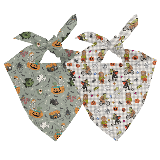 Two Halloween-themed dog bandanas on a white background
