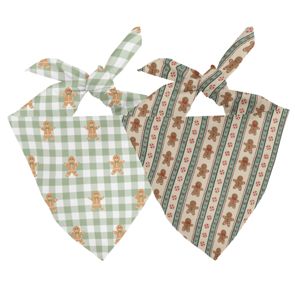 Two dog bandanas with gingerbread man patterns on a white background