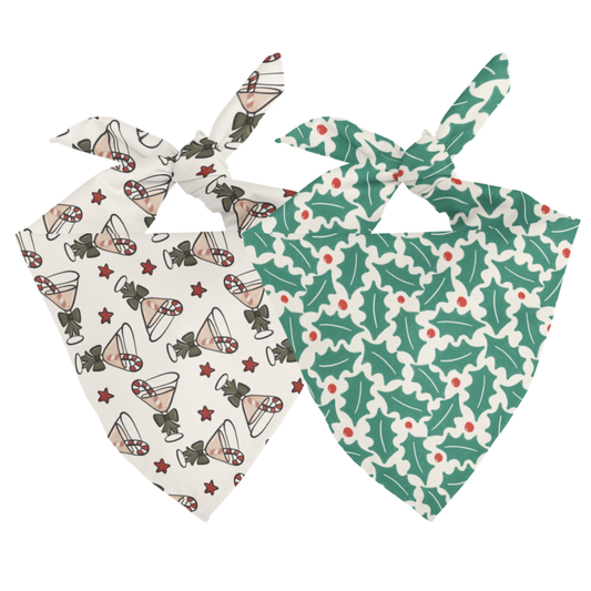 Two dog bandanas with festive patterns on a white background