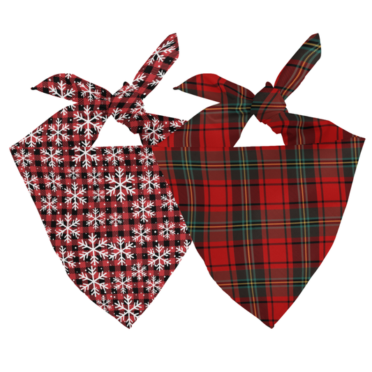 Two dog bandanas with plaid and snowflake patterns on a white background